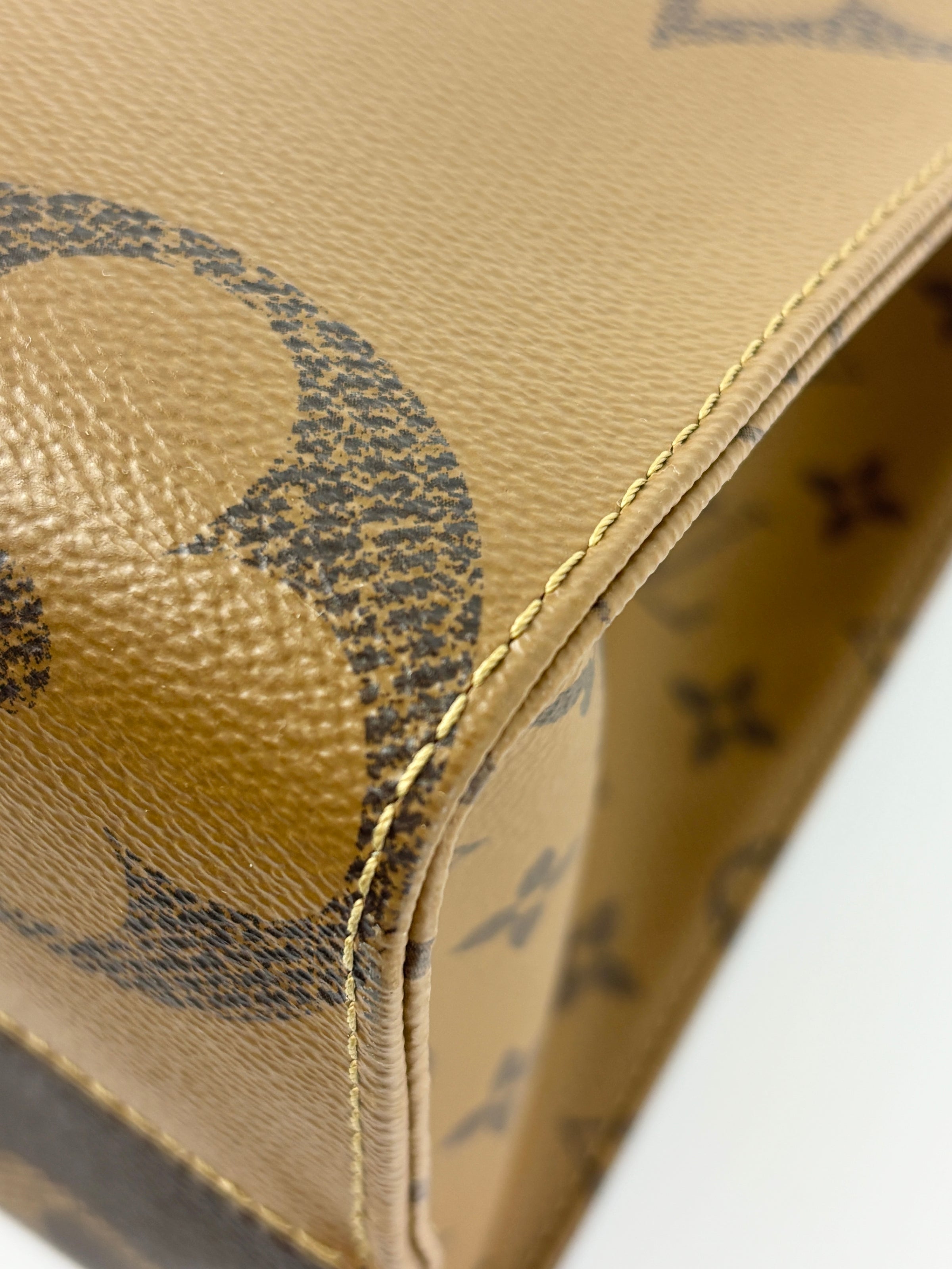 OnTheGo MM Monogram Reverse