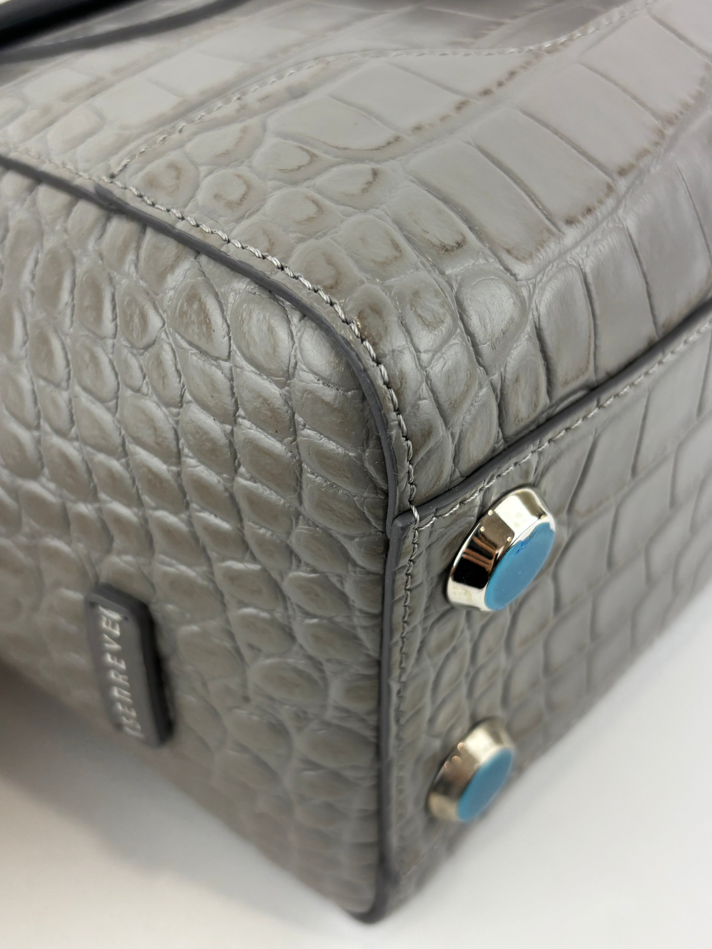 Maestra Embossed Leather Backpack in Grey