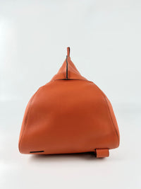 Anton Sling in Soft Grained Calfskin in Pumpkin