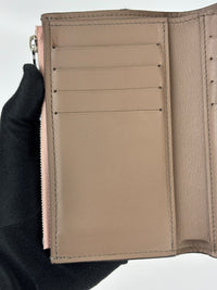 Capucines Compact Wallet in Magnolia Taurillon