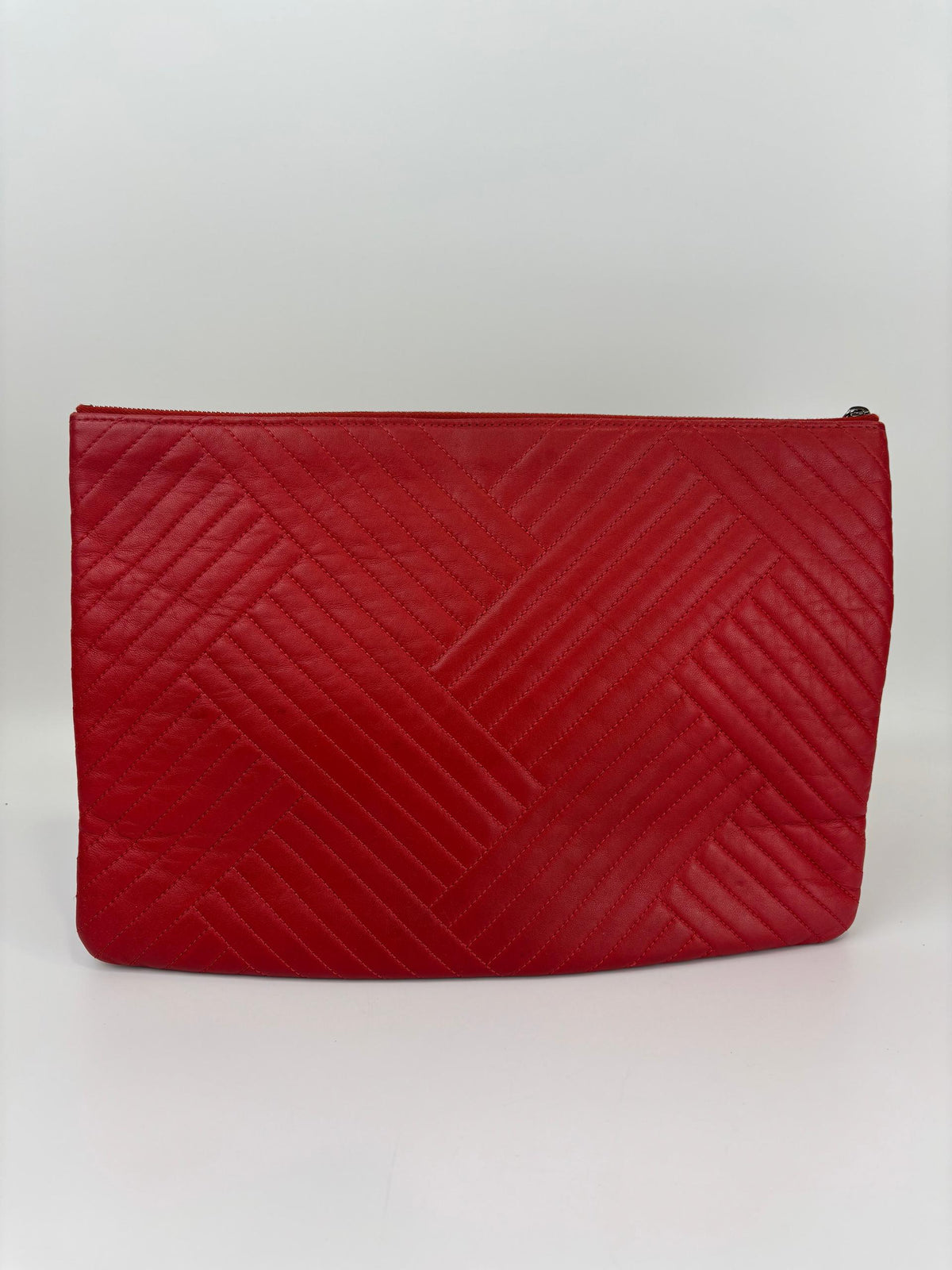 Large O Case Diagonal Quilted Lambskin Clutch in Red