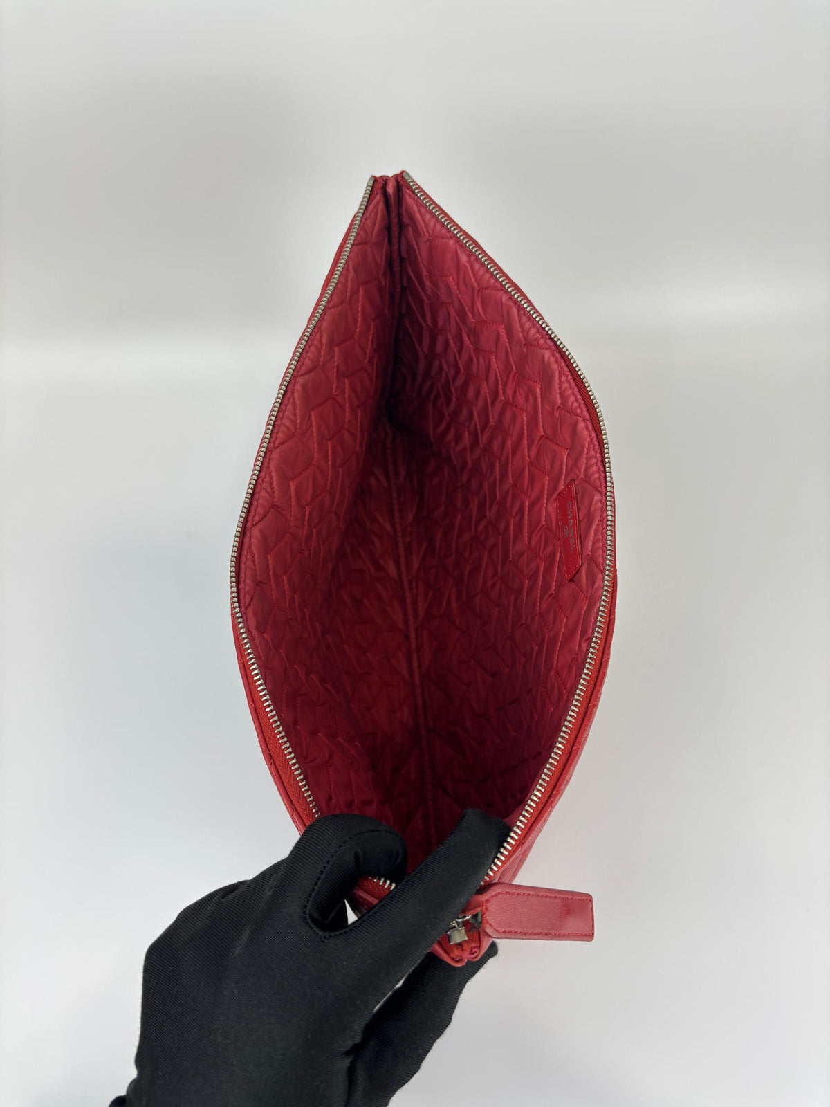 Large O Case Diagonal Quilted Lambskin Clutch in Red
