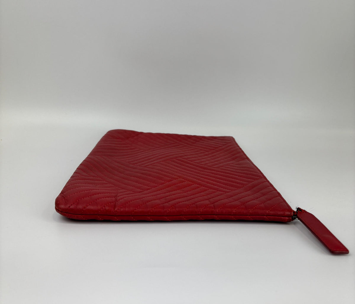 Large O Case Diagonal Quilted Lambskin Clutch in Red