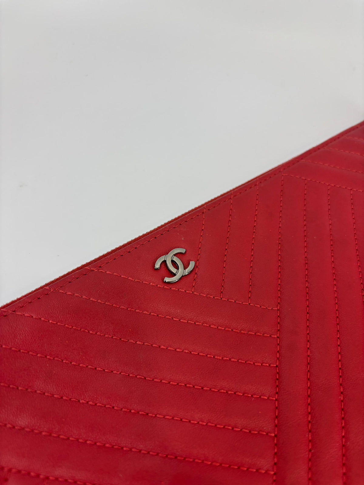 Large O Case Diagonal Quilted Lambskin Clutch in Red