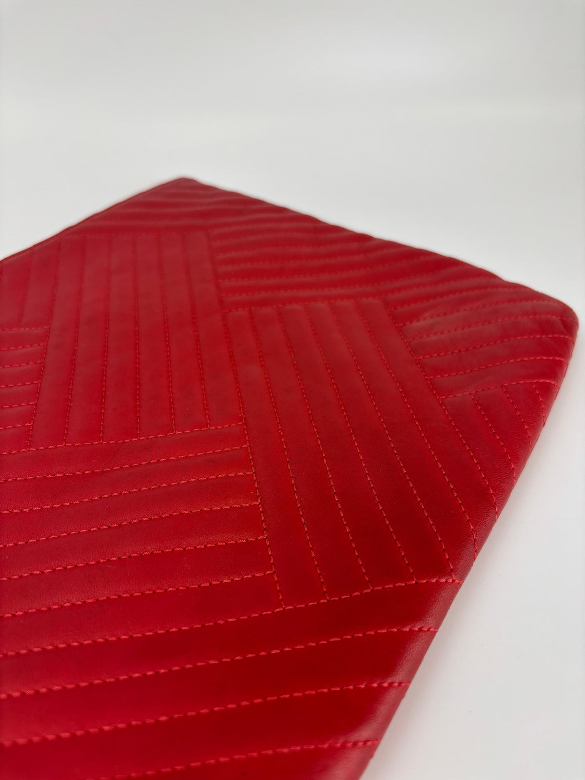 Large O Case Diagonal Quilted Lambskin Clutch in Red