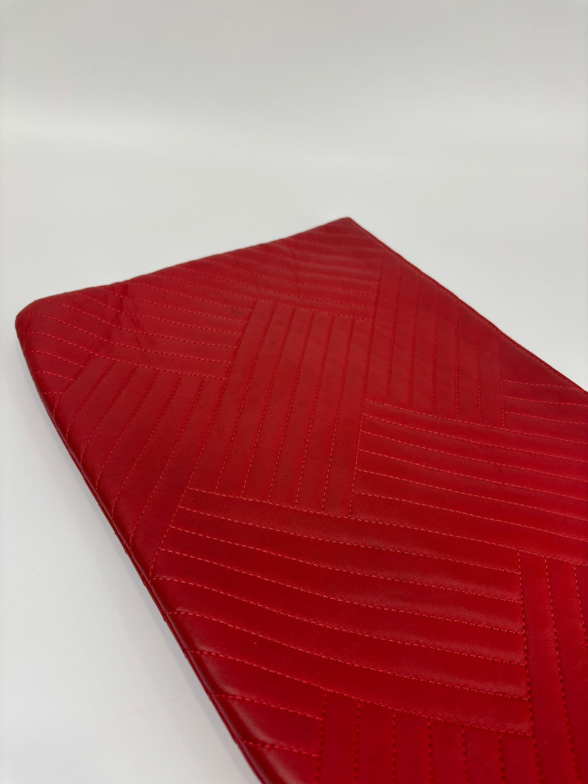 Large O Case Diagonal Quilted Lambskin Clutch in Red