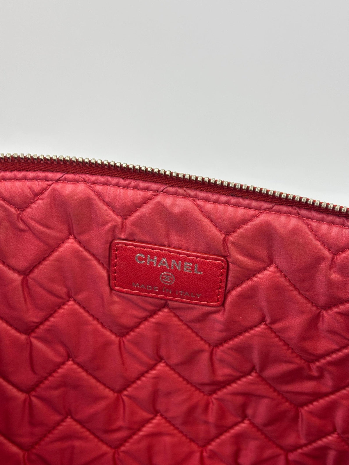 Large O Case Diagonal Quilted Lambskin Clutch in Red