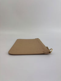 Neverfull Pouch in Monogram Empreinte Leather Crème