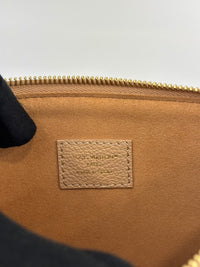 Neverfull Pouch in Monogram Empreinte Leather Crème