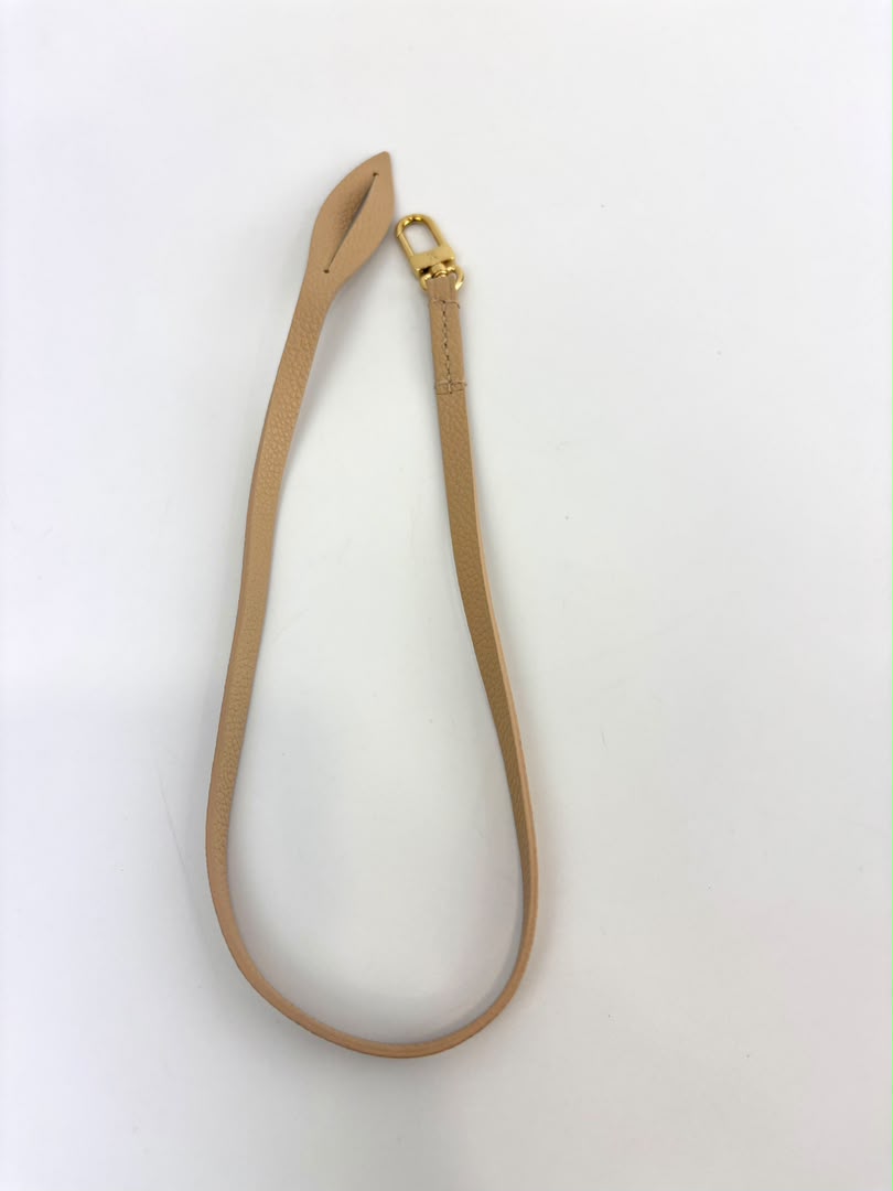Neverfull Pouch in Monogram Empreinte Leather Crème