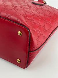 428226 Guccissima Top Handle Bag in Red Leather