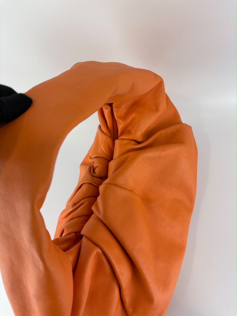 The Shoulder Pouch Orange Calfskin