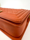 Boy Quilted Calfskin Old Medium Orange GHW