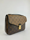 M44876 Monogram Reverse Pochette Metis (RFID)