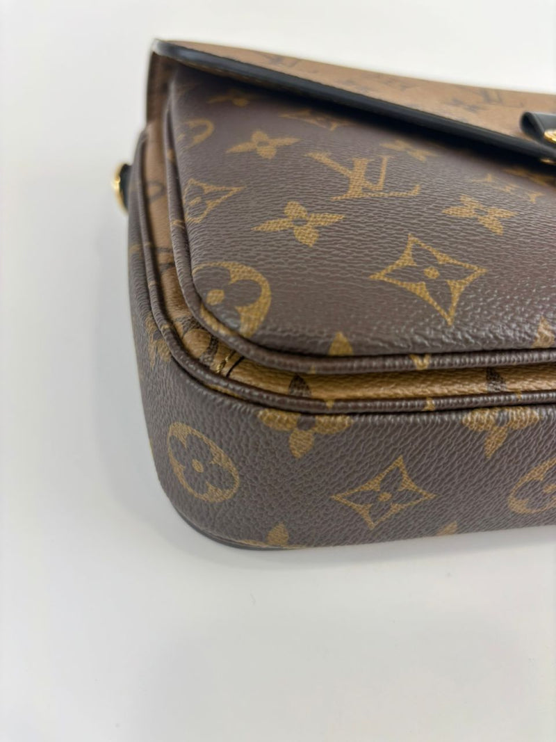 M44876 Monogram Reverse Pochette Metis (RFID)