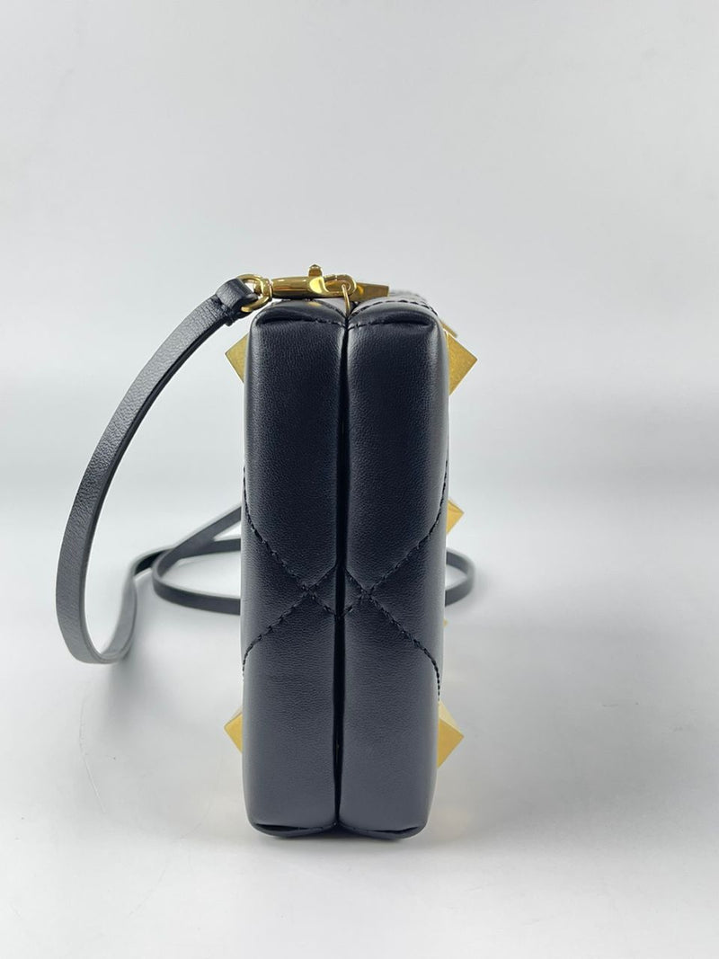 Roman Stud Leather Clutch Bag in Black