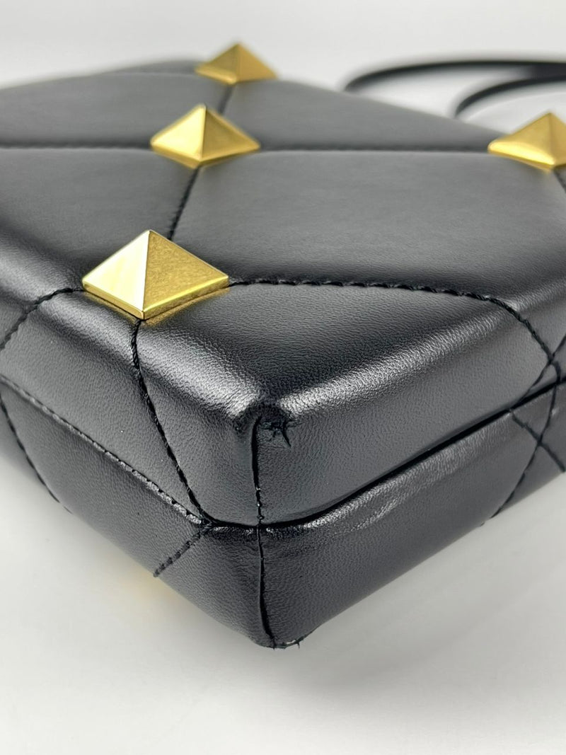 Roman Stud Leather Clutch Bag in Black