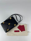 Roman Stud Leather Clutch Bag in Black