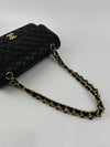 Medium 11.12 Classic Flap Black Caviar GHW