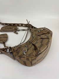Le Cagole Extra Small Monogram Coated Canvas Shoulder Bag in Brown - Glampot