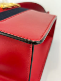 Gucci Sylvie Mini Leather Top Handle Crossbody Bag in Hibiscus Red - Glampot
