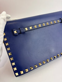 Valentino Garavani Rockstud Clutch in Navy - Glampot