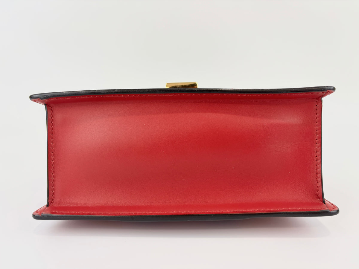 Gucci Sylvie Mini Leather Top Handle Crossbody Bag in Hibiscus Red - Glampot