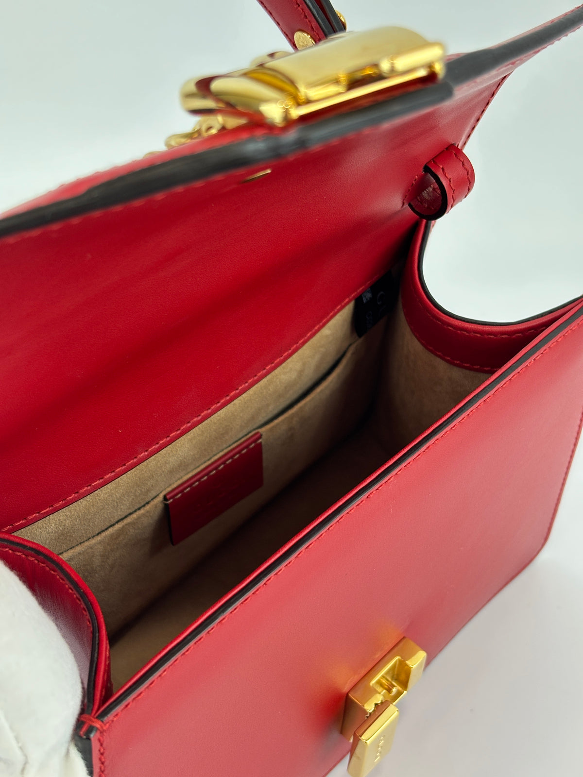 Gucci Sylvie Mini Leather Top Handle Crossbody Bag in Hibiscus Red - Glampot
