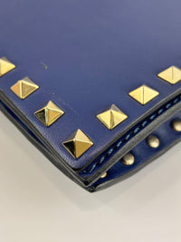 Valentino Garavani Rockstud Clutch in Navy - Glampot