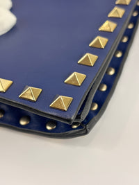 Valentino Garavani Rockstud Clutch in Navy - Glampot