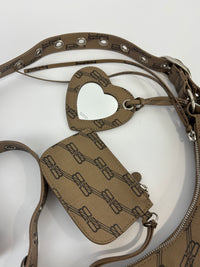 Le Cagole Extra Small Monogram Coated Canvas Shoulder Bag in Brown - Glampot