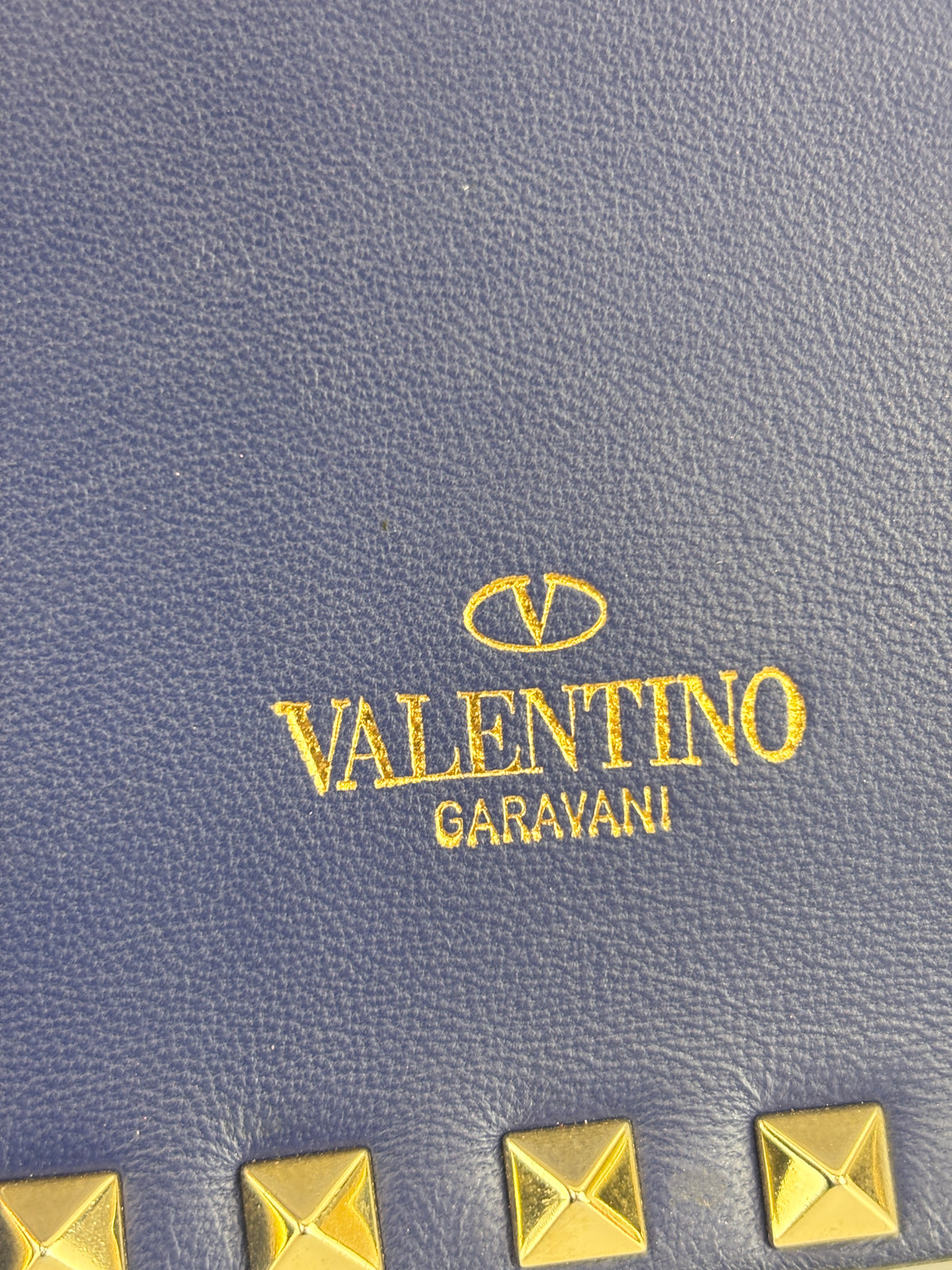 Valentino Garavani Rockstud Clutch in Navy - Glampot