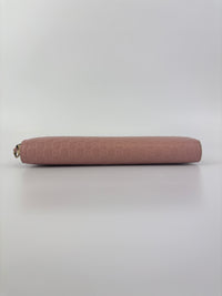Gucci Microguccissima Zip Around Long Wallet in Dusty Pink - Glampot