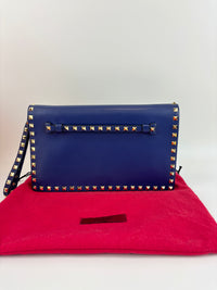 Valentino Garavani Rockstud Clutch in Navy - Glampot