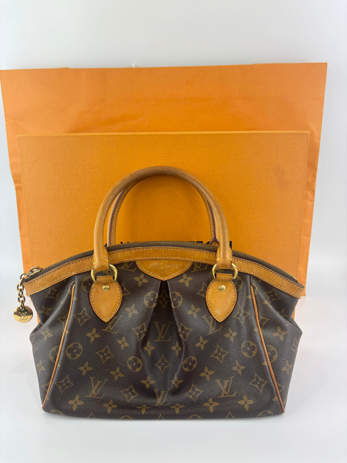 Louis Vuitton Tivoli PM Monogram Canvas - Glampot