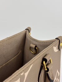 Louis Vuitton OnTheGo PM Bicolour Monogram Empreinte Tourterelle/Creme - Glampot