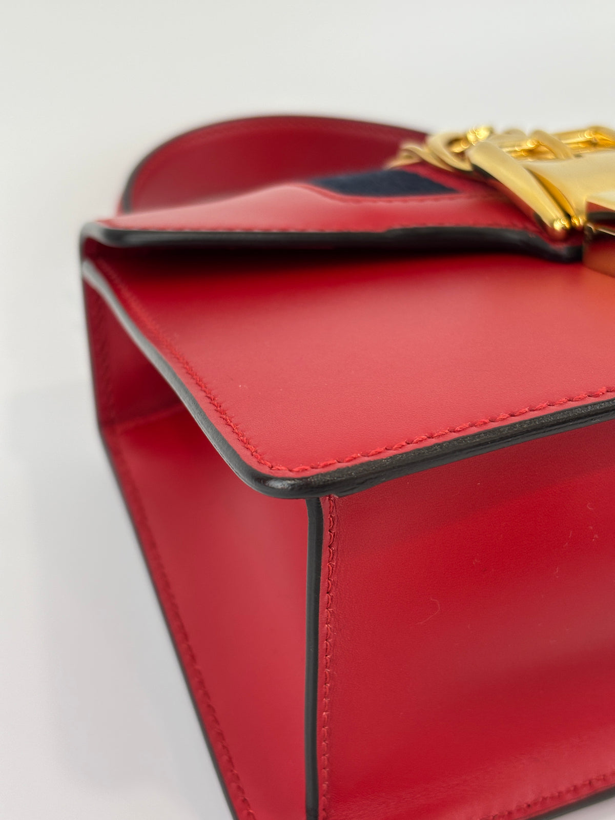 Gucci Sylvie Mini Leather Top Handle Crossbody Bag in Hibiscus Red - Glampot