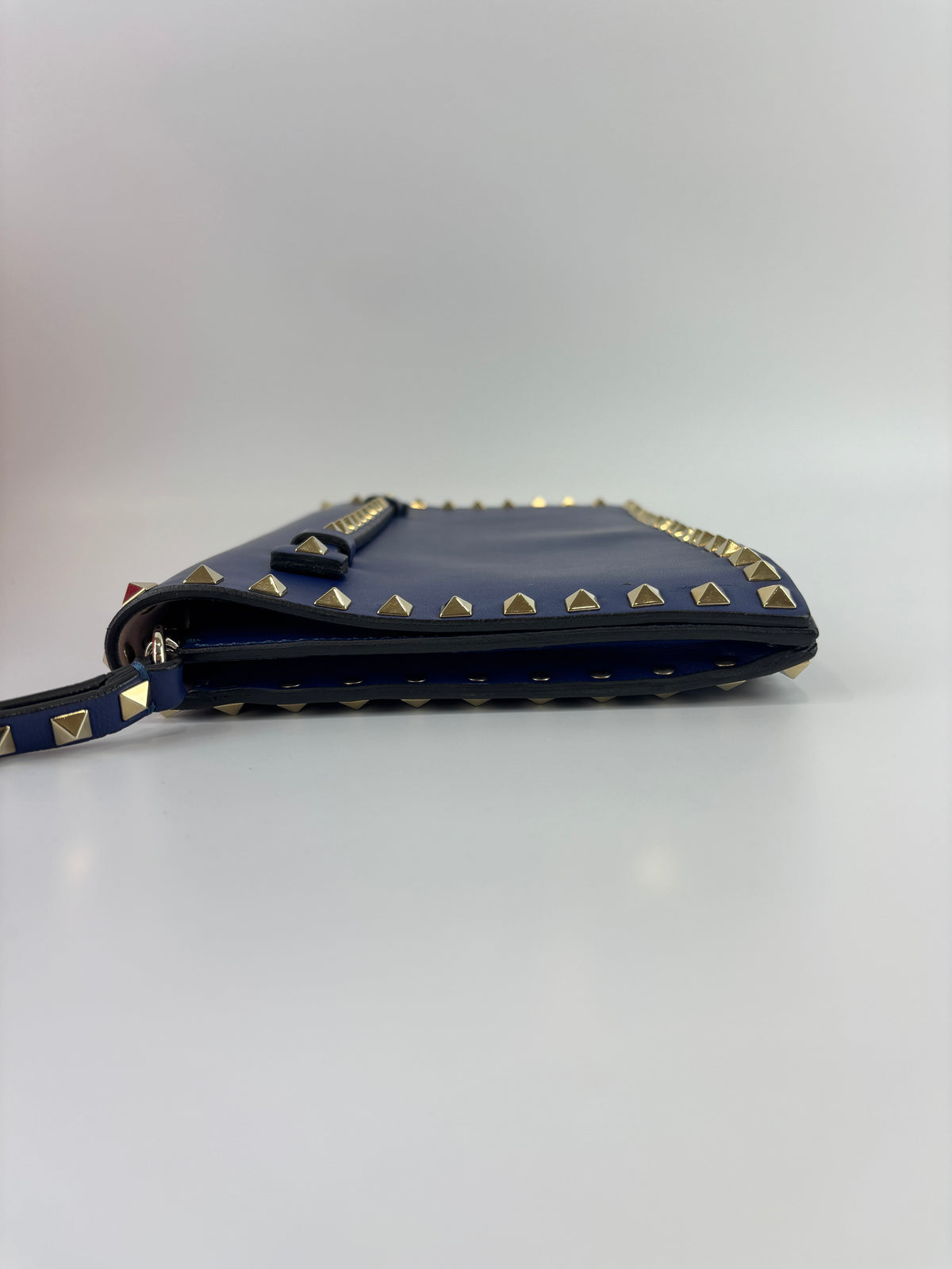 Valentino Garavani Rockstud Clutch in Navy - Glampot