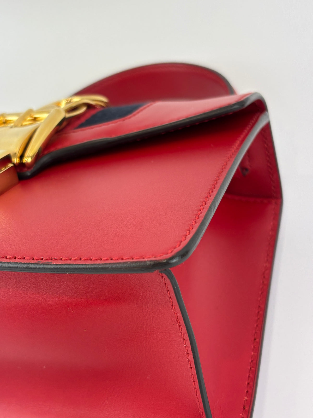Gucci Sylvie Mini Leather Top Handle Crossbody Bag in Hibiscus Red - Glampot