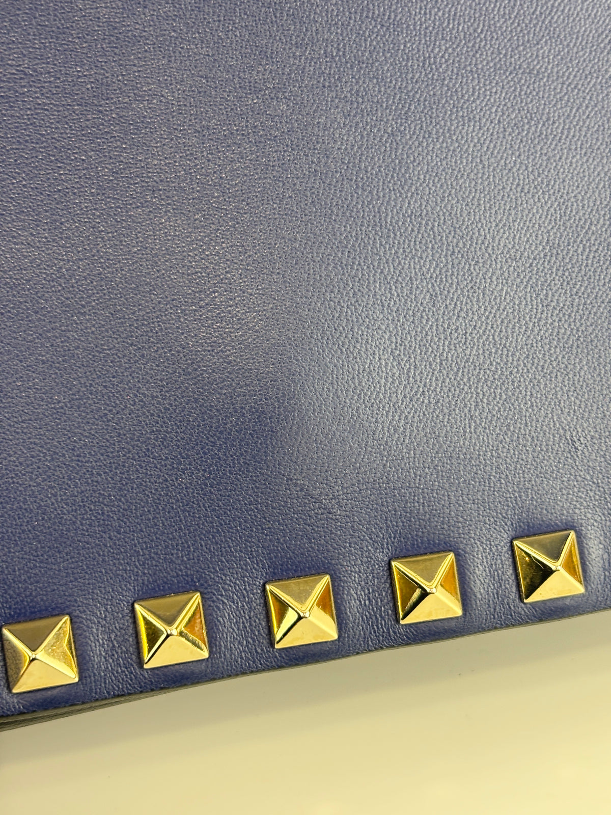 Valentino Garavani Rockstud Clutch in Navy - Glampot